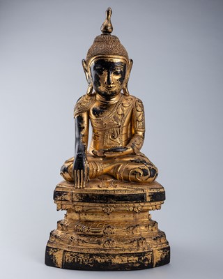 Lot 444 - A GILT LACQUERED WOOD FIGURE OF BUDDHA SHAKYAMUNI, LATE 19TH CENTURY