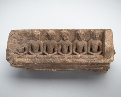 Lot 1211 - A SANDSTONE FRAGMENT WITH BUDDHAS, 10TH- 12TH CENTURY