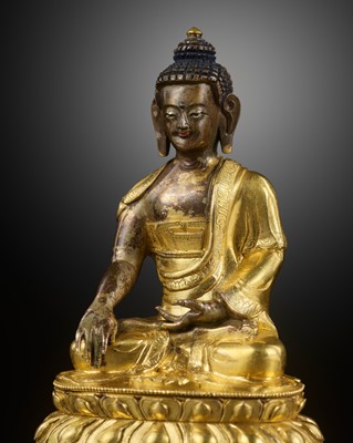 A GILT-BRONZE FIGURE OF BUDDHA SHAKYAMUNI, QING DYNASTY