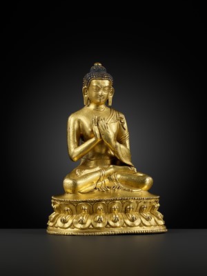 Lot 17 - A GILT-BRONZE FIGURE OF SHAKYAMUNI BUDDHA, TIBET, 15TH – 16th CENTURY