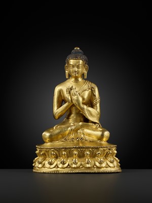 Lot 17 - A GILT-BRONZE FIGURE OF SHAKYAMUNI BUDDHA, TIBET, 15TH – 16th CENTURY