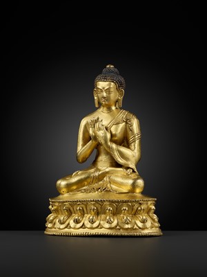 Lot 17 - A GILT-BRONZE FIGURE OF SHAKYAMUNI BUDDHA, TIBET, 15TH – 16th CENTURY