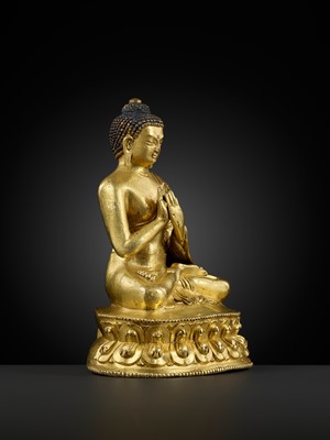 Lot 17 - A GILT-BRONZE FIGURE OF SHAKYAMUNI BUDDHA, TIBET, 15TH – 16th CENTURY