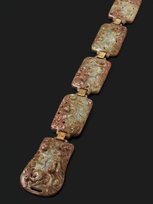 Lot 90 - A CELADON AND RUSSET JADE ‘FOUR GUARDIANS’ BELT, EASTERN HAN DYNASTY