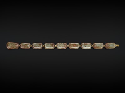 Lot 90 - A CELADON AND RUSSET JADE ‘FOUR GUARDIANS’ BELT, EASTERN HAN DYNASTY