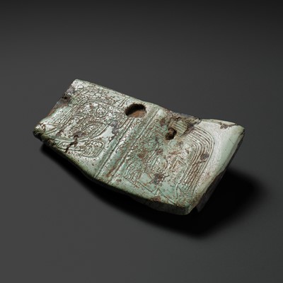 A TURQUOISE MATRIX ‘MYTHICAL BEAST’ FRAGMENT, LATE SHANG TO WESTERN ZHOU DYNASTY