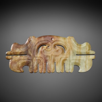 A LARGE RUSSET AND PALE CELADON TOOTHED ANIMAL MASK ORNAMENT, HONGSHAN CULTURE