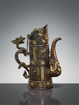 Lot 5 - A PARCEL-GILT COPPER REPOUSSÉ RITUAL EWER, DUOMUHU, TIBET, 19TH CENTURY