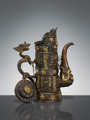 Lot 5 - A PARCEL-GILT COPPER REPOUSSÉ RITUAL EWER, DUOMUHU, TIBET, 19TH CENTURY