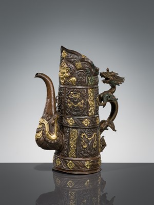 Lot 5 - A PARCEL-GILT COPPER REPOUSSÉ RITUAL EWER, DUOMUHU, TIBET, 19TH CENTURY