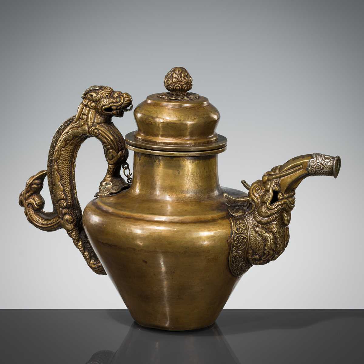 Lot 6 - A SILVER-APPLIED BRONZE RITUAL TEAPOT