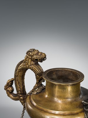 Lot 6 - A SILVER-APPLIED BRONZE RITUAL TEAPOT