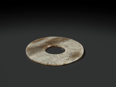 Lot 139 - A MOTTLED WHITE AND RUSSET JADE DISK, BI, QIJIA CULTURE