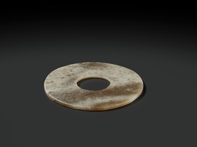 Lot 139 - A MOTTLED WHITE AND RUSSET JADE DISK, BI, QIJIA CULTURE