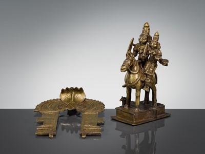 Lot 300 - A BRASS FIGURE OF KHANDOBA AND MHALSA, 18TH-19TH CENTURY