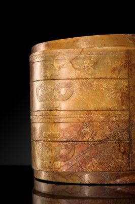 AN UNUSUALLY LARGE AND MASSIVE (15.9 KG) LIANGZHU-STYLE FOUR-TIERED YELLOW-RUSSET JADE CONG