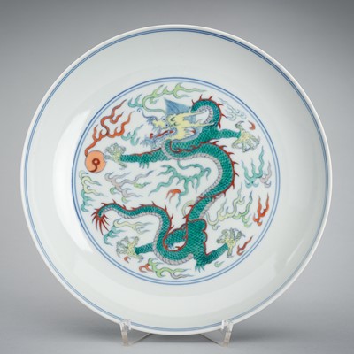 Lot 1976 - A DOUCAI ‘DRAGON’ PORCELAIN DISH, c. 1920s