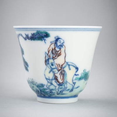 Lot 1974 - A DOUCAI ‘SCHOLAR AND ATTENDANT’ PORCELAIN WINE CUP, c. 1920s