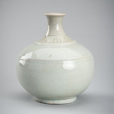 Lot 955 - A PALE CELADON GLAZED PORCELAIN VASE, LATE JOSEON DYNASTY