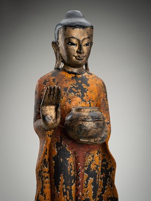 Lot 1076 - A TALL LACQUERED BURMESE WOOD FIGURE OF BUDDHA, 19TH CENTURY