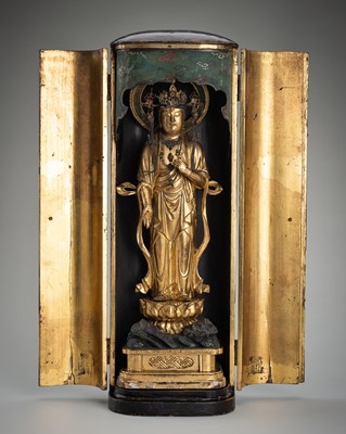 Lot 321 - A LACQUERED WOOD ZUSHI (PORTABLE SHRINE) CONTAINING A GILT WOOD FIGURE OF KANNON