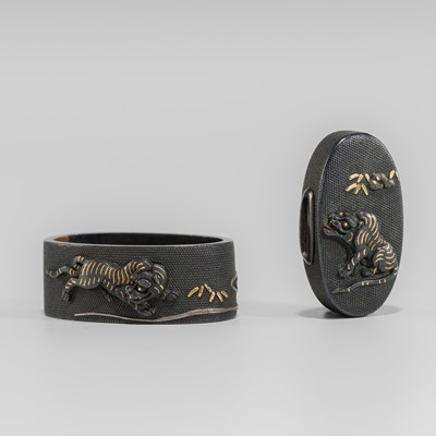 Lot 641 - NAGAMASA: A FINE SHAKUDO FUCHI AND KASHIRA WITH TIGERS