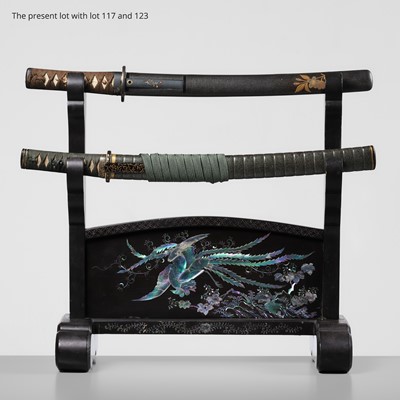 Lot 114 - A VERY FINE MOTHER-OF-PEARL-INLAID BLACK LACQUER KATANE-KAKE (SWORD STAND) DEPICTING HO-O NO KIRI