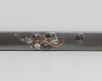 Lot 1583 - A SHIBUICHI KOZUKA WITH BLOSSOMS AND FOLIAGE