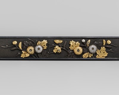 Lot 575 - TAKATOSHI: A FINE SHAKUDO KOZUKA WITH CHRYSANTHEMUMS