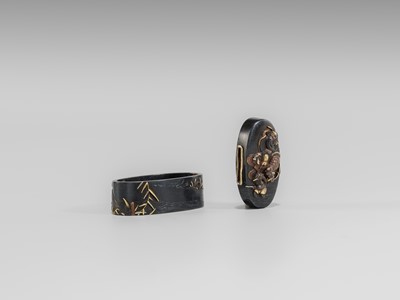 Lot 581 - A FINE HAMANO SCHOOL SHAKUDO FUCHI AND KASHIRA WITH SHOKI AND ONI