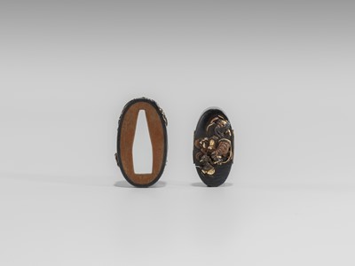 Lot 581 - A FINE HAMANO SCHOOL SHAKUDO FUCHI AND KASHIRA WITH SHOKI AND ONI