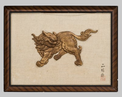 Lot 1976 - ISSHIN: A FRAMED GILT-IRON SHISHI PLAQUE