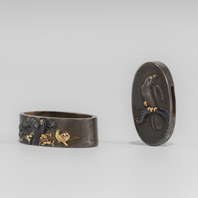 Lot 643 - A SHIBUICHI FUCHI AND KASHIRA WITH A MAJUESTIC HAWK