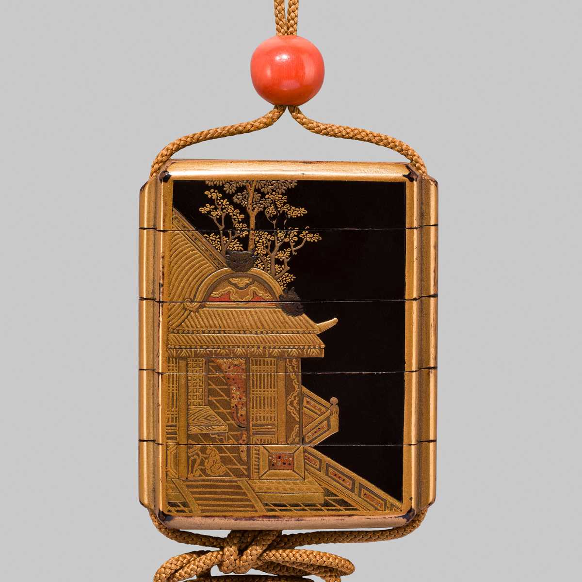 Lot 215 - A BLACK AND GOLD LACQUER FOUR-CASE INRO