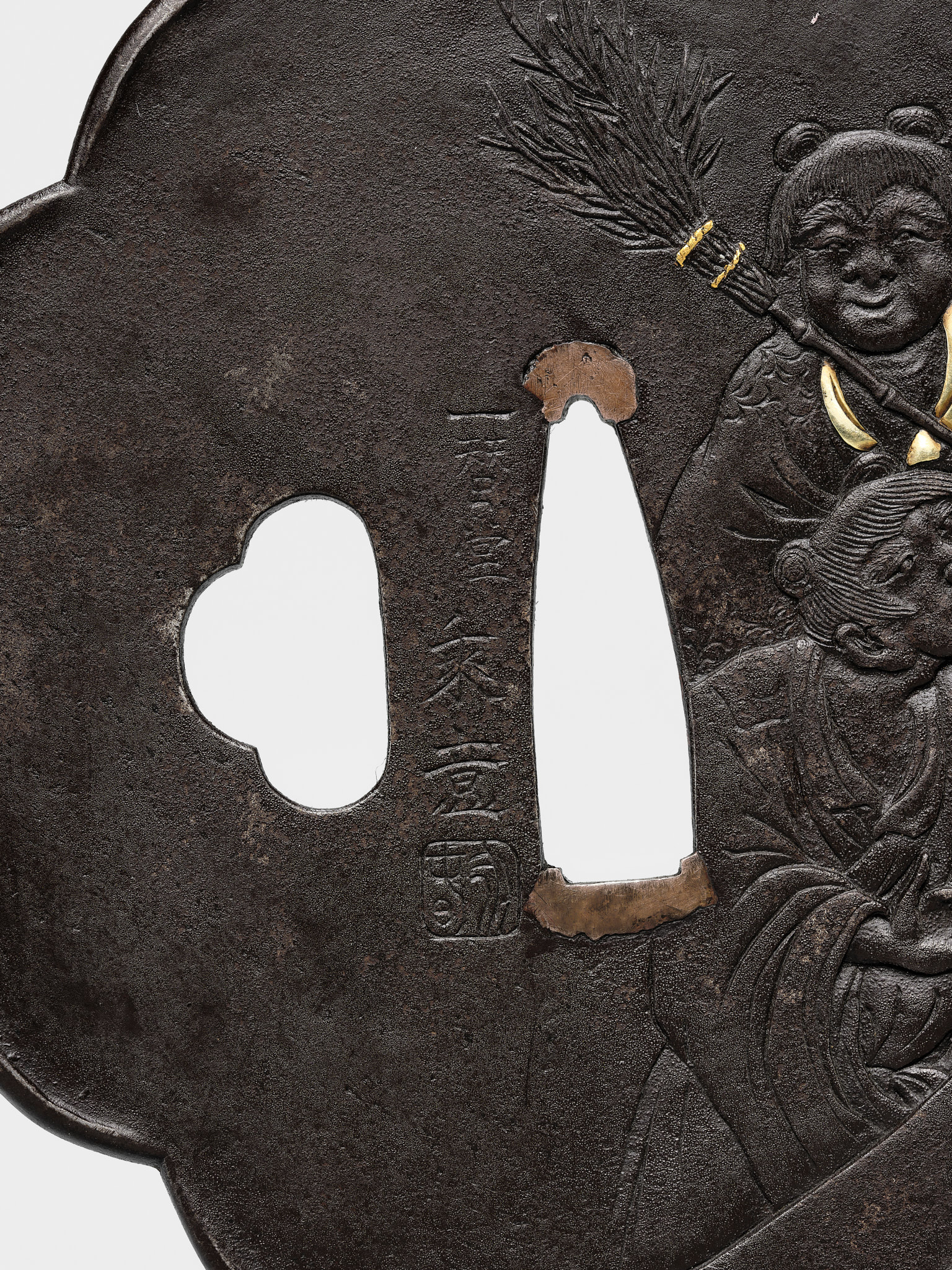 Lot 621 - SUGIURA JOI: AN IRON TSUBA DEPICTING KANZAN
