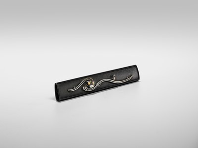 Lot 84 - A SHAKUDO KOZUKA WITH TWO MANDARIN DUCKS (OSHIDORI) IN WAVES