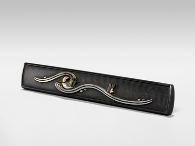 Lot 84 - A SHAKUDO KOZUKA WITH TWO MANDARIN DUCKS (OSHIDORI) IN WAVES