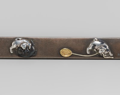 Lot 589 - TAMAGAWA YOSHINAGA: A SUPERB SHIBUICHI KOZUKA WITH PUPPIES AT PLAY