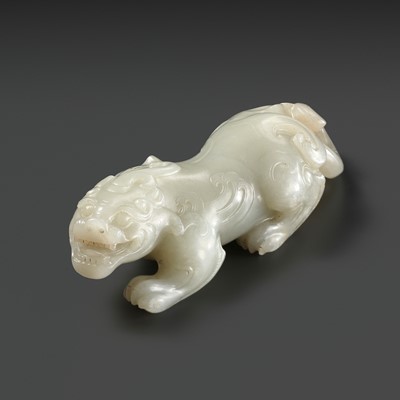 Lot 104 - A RARE AND LARGE WHITE JADE FIGURE OF A BIXIE, QIANLONG