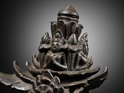 Lot 264 - A BRONZE PALANQUIN HOOK, KHMER EMPIRE, 12TH-13TH CENTURY