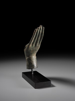 Lot 371 - A LIFESIZE BRONZE HAND OF BUDDHA, SUKHOTHAI KINGDOM