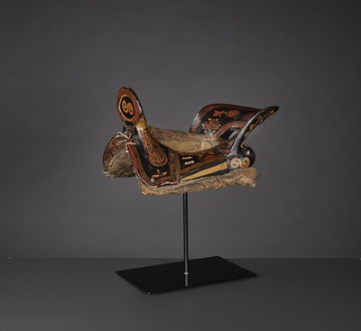 Lot 50 - A LACQUERED WOOD SADDLE, QING DYNASTY