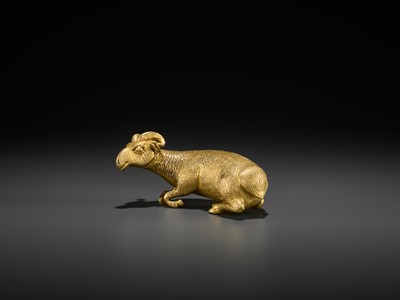 Lot 82 - A GILT BRONZE FIGURE OF A RECUMBENT ‘LONGEVITY’ RAM, MING DYNASTY