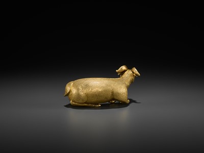 Lot 82 - A GILT BRONZE FIGURE OF A RECUMBENT ‘LONGEVITY’ RAM, MING DYNASTY