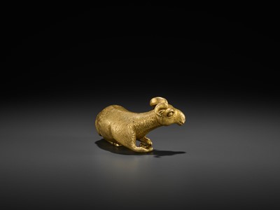 Lot 82 - A GILT BRONZE FIGURE OF A RECUMBENT ‘LONGEVITY’ RAM, MING DYNASTY