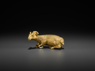 Lot 82 - A GILT BRONZE FIGURE OF A RECUMBENT ‘LONGEVITY’ RAM, MING DYNASTY