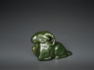 Lot 167 - A MASSIVE SPINACH GREEN JADE MODEL OF A RECUMBENT RAM, QING DYNASTY