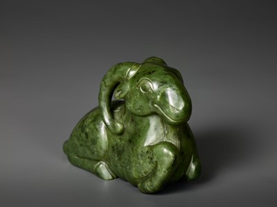 Lot 167 - A MASSIVE SPINACH GREEN JADE MODEL OF A RECUMBENT RAM, QING DYNASTY