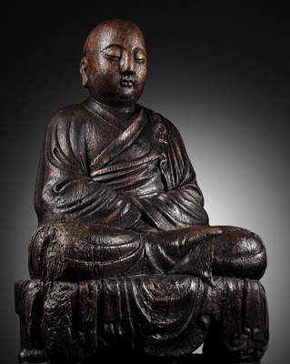 Lot 45 - A CARVED WOOD FIGURE OF A LUOHAN, PROBABLY AMOGHAVAJRA (705-774), SONG TO YUAN DYNASTY