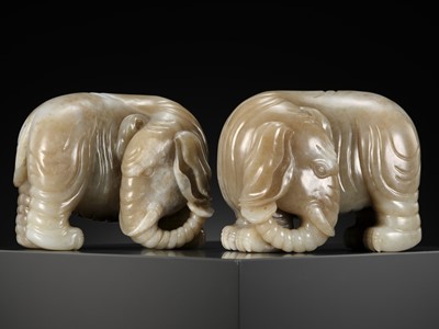 Lot 105 - A PAIR OF PALE BROWN AND WHITE JADE ‘ELEPHANT’ FIGURES, QING DYNASTY, 18TH CENTURY